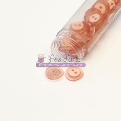 Frasco com botões cor de rosa e etiqueta fios d'arte