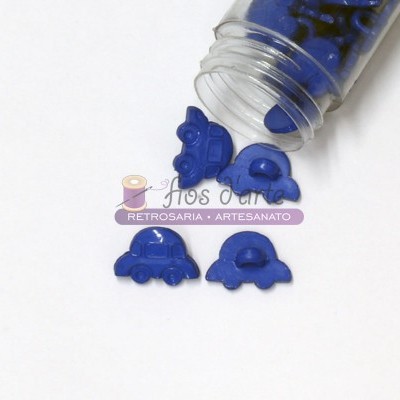 Botões de plástico azul em forma de carro a sair de frasco transparente