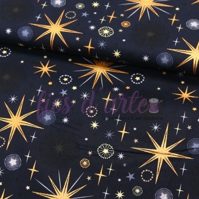 Tecido preto com padrão de estrelas amarelas e brancas