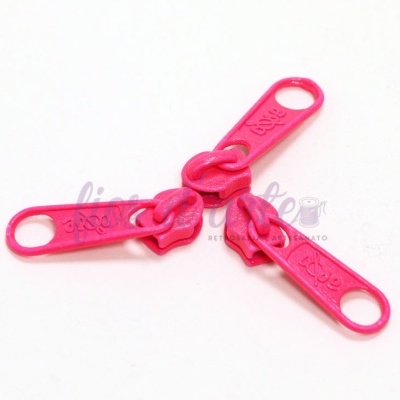 Três cursoras de zíper rosa