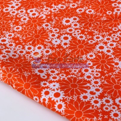 tecido com padrão floral laranja e branco