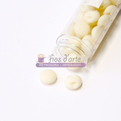 frasco com botões brancos lisos e redondos