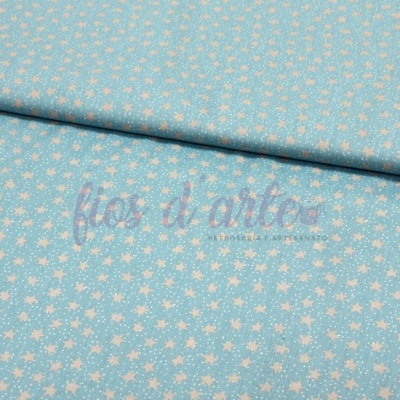 Tecido azul claro com estrelas brancas e dobra no centro