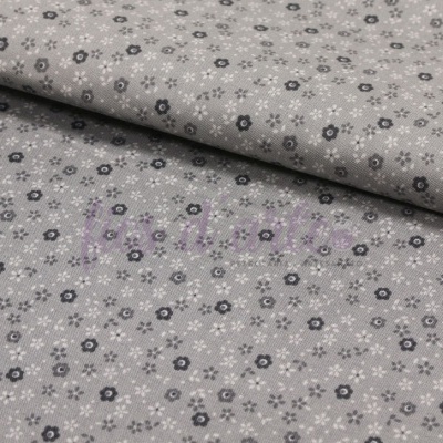 Tecido cinzento com padrão de pequenas flores pretas e brancas