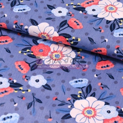 tecido azul com padrão floral colorido