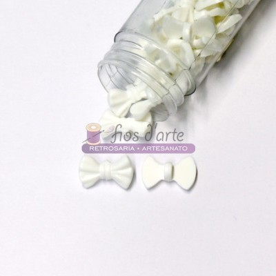 Frasco transparente com botões brancos em forma de laço