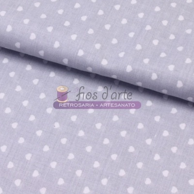 tecido azul claro com gotas brancas e texto fios d'arte