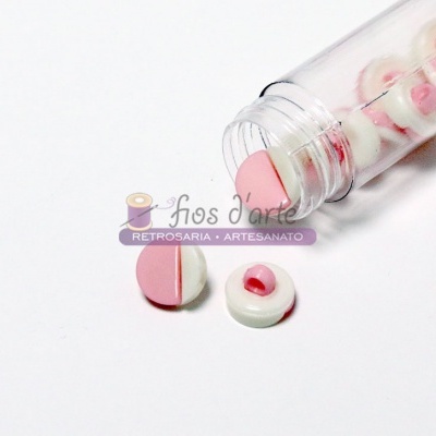 Frascos transparentes com botões redondos rosa e branco