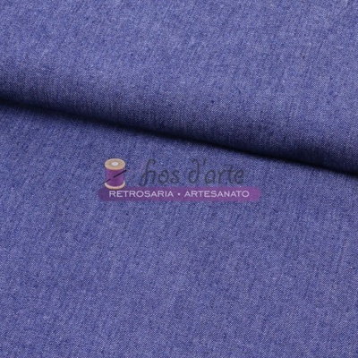 Tecido azul claro dobrado com texto '6 fios d'arte RETROSARIA • ARTESANATO'