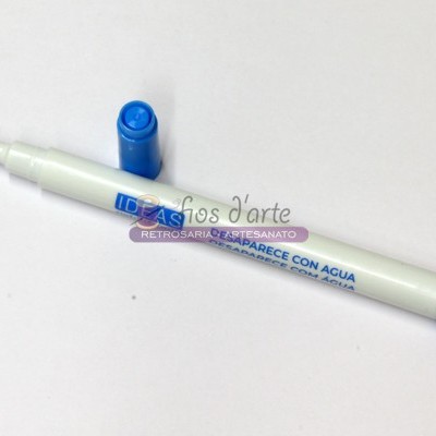 Marcador para tecido branco com tampa e ponta azul com texto azul
