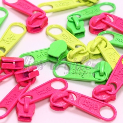 Puxadores de fecho éclair coloridos em plástico nas cores verde, amarelo e rosa