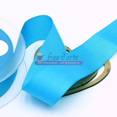 Rolo de fita azul turquesa canelada com etiqueta fios d'arte