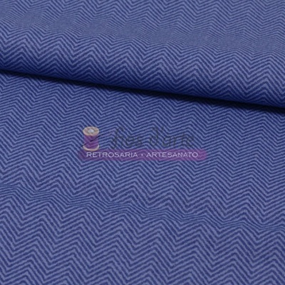 Tecido azul com padrão de espinha de peixe em ziguezague