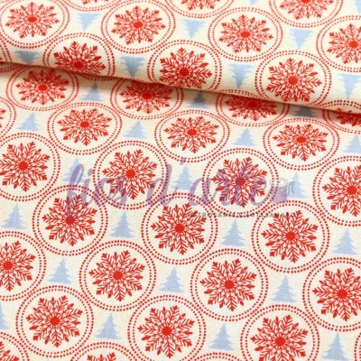 Tecido branco com padrão de círculos vermelhos e detalhes azuis