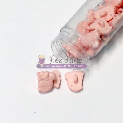 Botões cor-de-rosa em forma de ursinho e número num frasco transparente