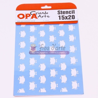 Stencil azul com silhuetas de ananás em branco embalado em cartão laranja