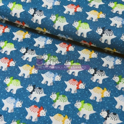 Tecido azul com elefantes coloridos padrão repetido