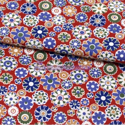 tecido estampado com padrão floral colorido em algodão