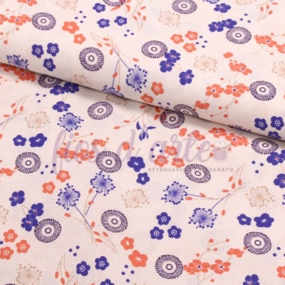 Tecido estampado floral colorido sobre fundo rosa claro