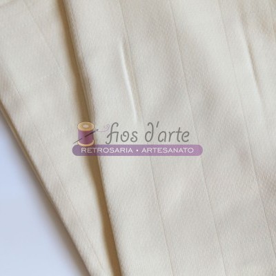Tecido bege claro com costuras verticais