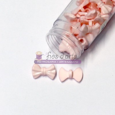 Frasco com laços decorativos pequenos cor de rosa