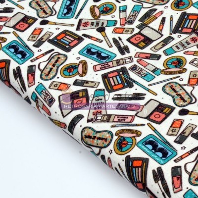 Tecido estampado com padrão de maquilhagem colorido