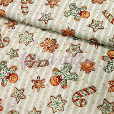 Tecido natalício com padrão de biscoitos e flocos de neve coloridos em fundo bege