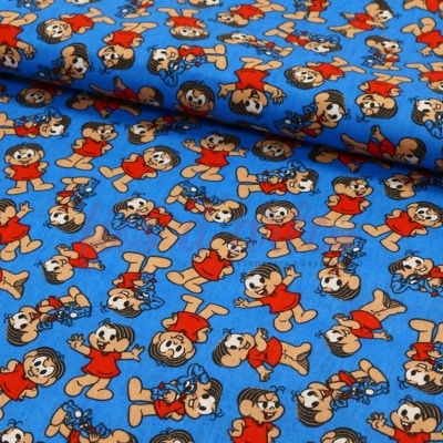 Tecido azul com padrão de personagens de desenhos animados em vermelho e amarelo