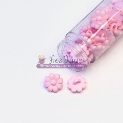 Frasco transparente com botões flor cor-de-rosa