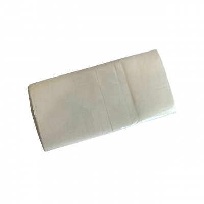 Guardanapo de tecido branco dobrado