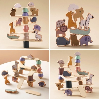 Brinquedos de madeira de animais coloridos empilhados e equilibrados