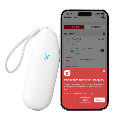 Termohigrómetro branco e smartphone com alerta de temperatura baixa
