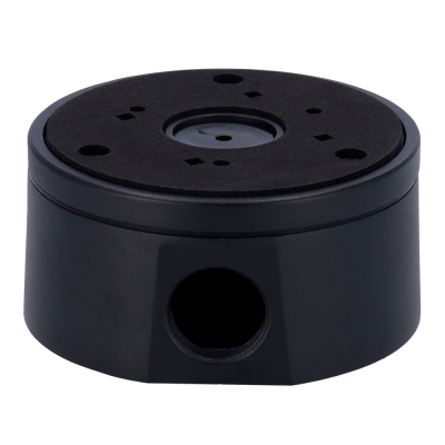 Base de montagem preta cilíndrica com orifícios na parte superior e frontal.
