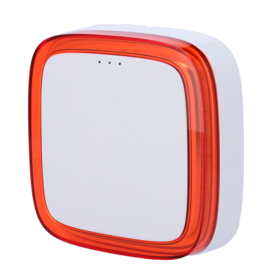 Dispositivo quadrado branco com borda alaranjada e três pequenos orifícios no topo