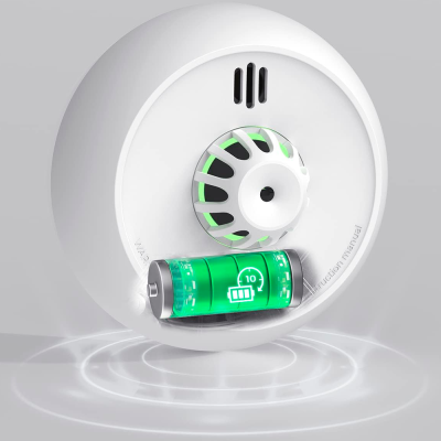 Detector de fumo branco com display verde e botão giratório central.