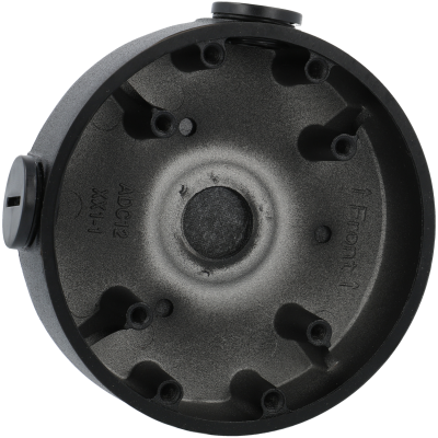 caixa redonda preta de metal com inscrições e suportes internos