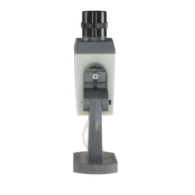 Microscópio compacto cinza visto de frente com lente preta no topo e base robusta