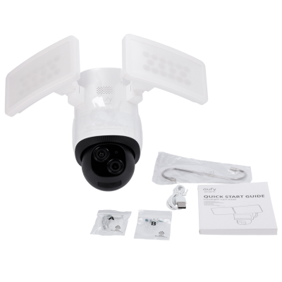 Câmara de segurança eufy com dois painéis de luz branca, acessórios e manual de instruções