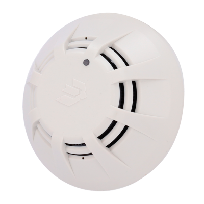 Detector de fumo branco redondo com aberturas e símbolo em relevo