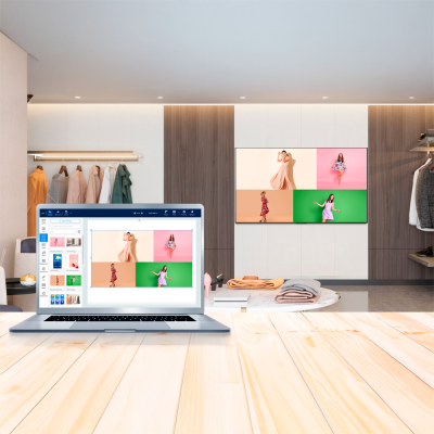 Portátil numa mesa com imagens de moda, roupa pendurada e ambiente moderno de loja