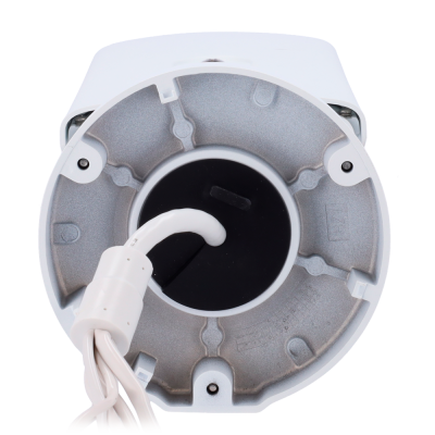 Base mecânica redonda cinzenta com cabos brancos e parafusos visíveis