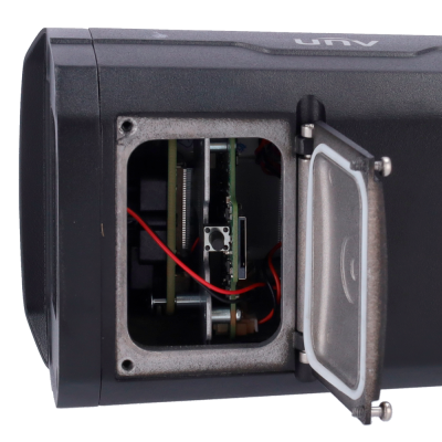 Dispositivo eletrônico preto com painel aberto mostrando componentes internos