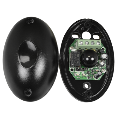 Dispositivo oval preto com placa eletrónica exposta