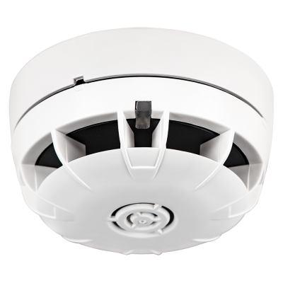 Detetor de fumo redondo branco com aberturas pretas e padrão circular central