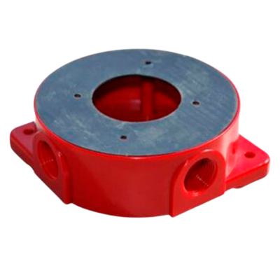 Peça mecânica circular vermelha com tampa metálica cinza
