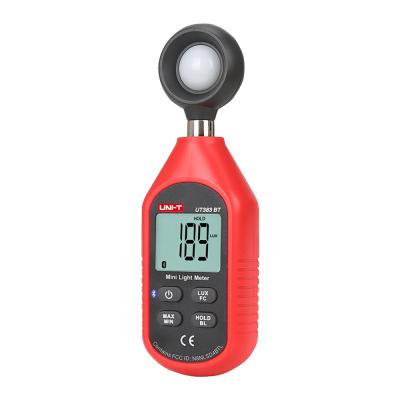 Medidor digital de luz portátil vermelho e preto com visor LCD a mostrar a leitura de luz