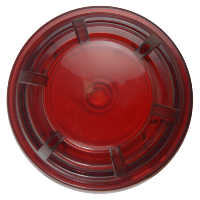 Objeto circular vermelho translúcido com apoios sobre superfície branca