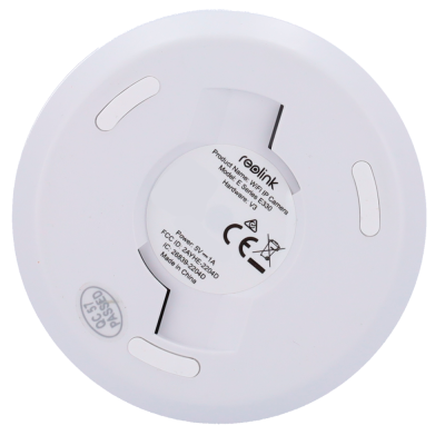 Base circular branca de material plástico com etiqueta central e texto informativo preto.