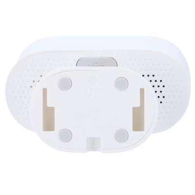 Dispositivo electrónico branco com padrão perfurado e base com a palavra UP