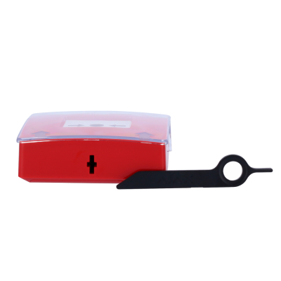 Aparelho vermelho com tampa transparente e peça preta com círculo branco